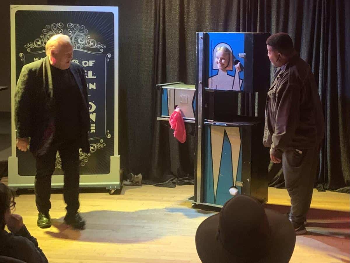 Magician Michael Clayton performs Zig Zag Illusion with Assistant at event in Horn Lake Mississippi